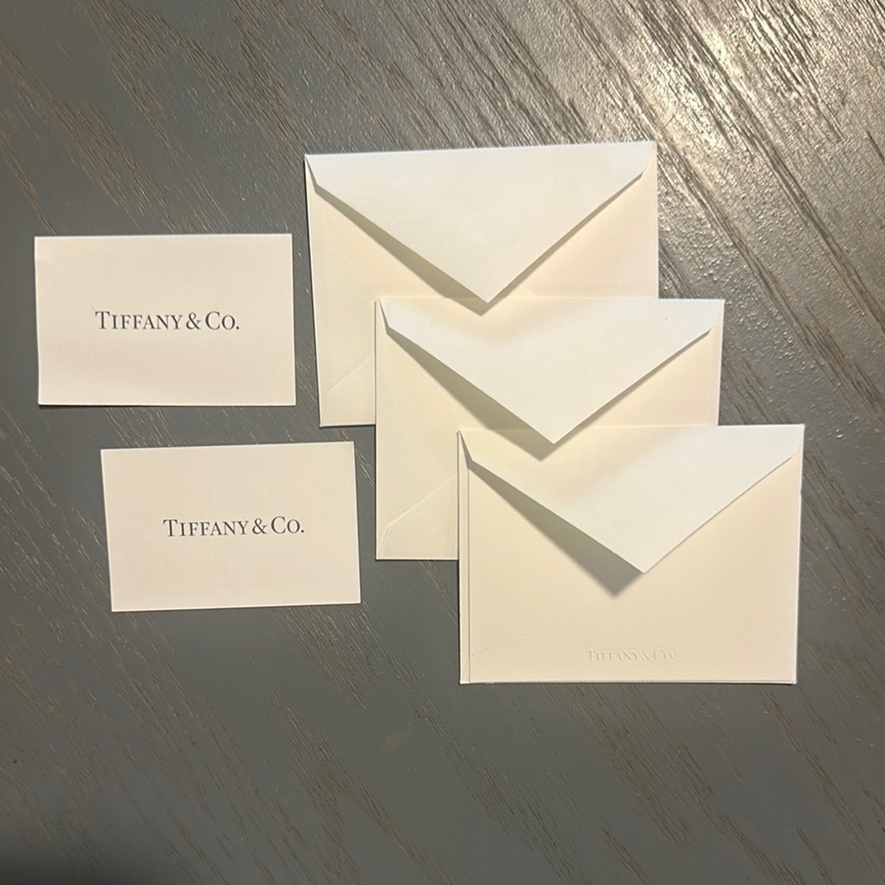 Tiffany & Co. 3 gift cards and 2 sterling silver care cards